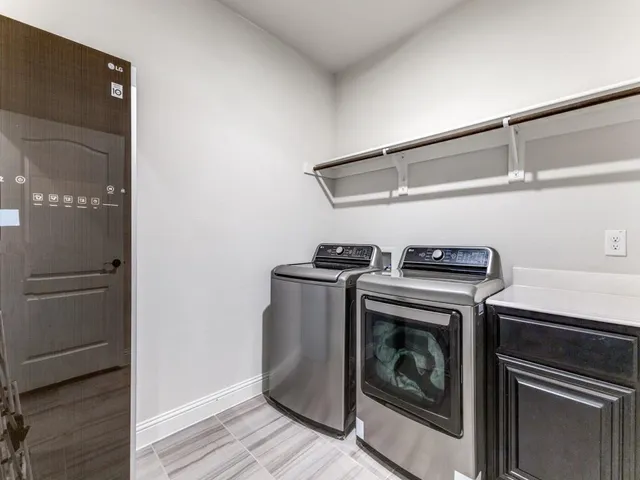 a stove top oven sitting inside of a kitchen