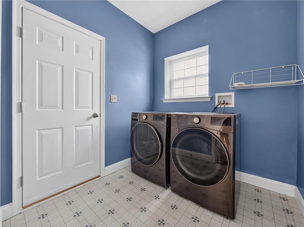3821 Rittenhouse Road Lower Macungie Township, PA 18062 - Photo 57 of 62 Functional laundry room, equipped with modern appliances and a bright window.