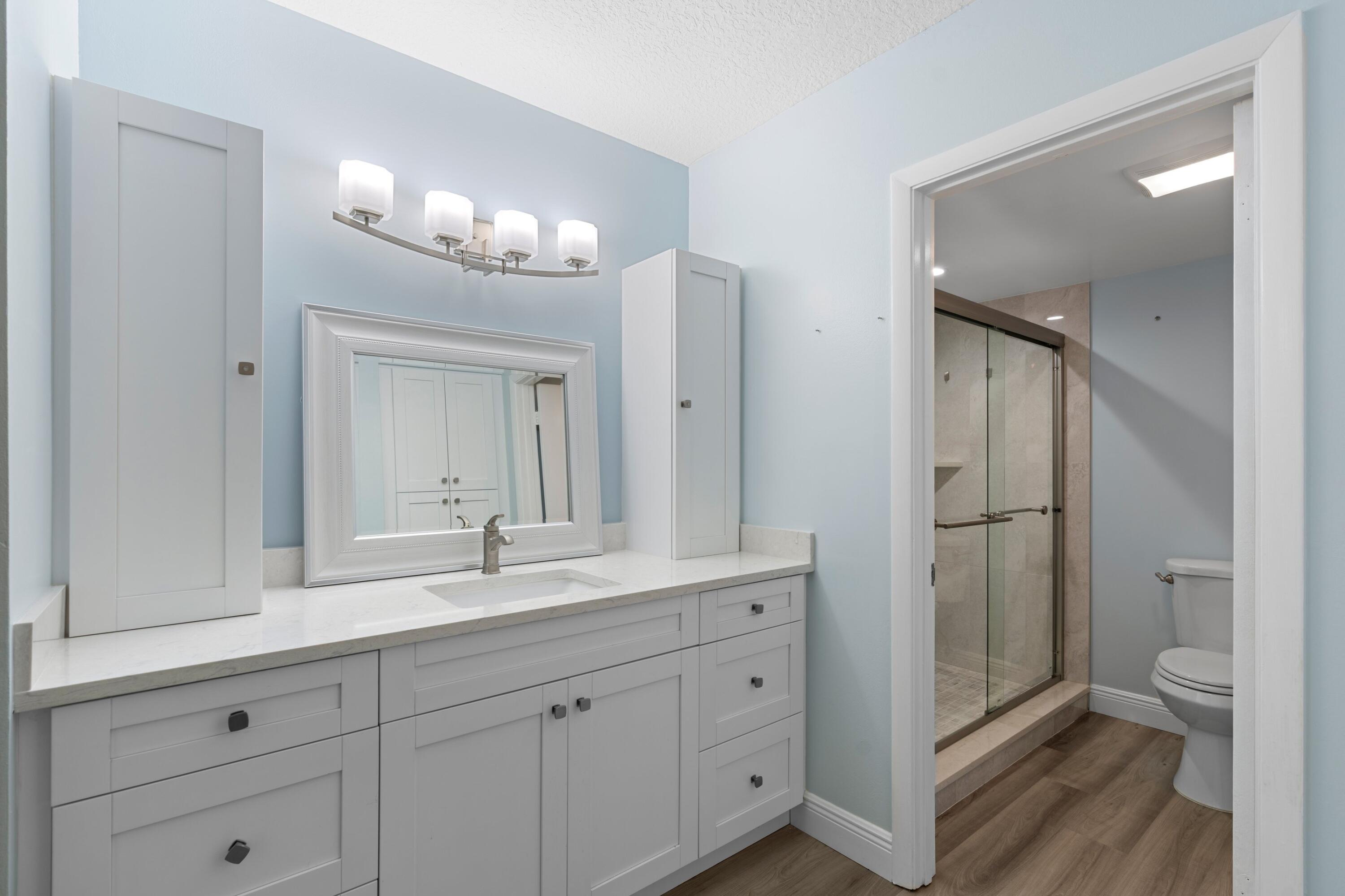 9286 Vista Del Lago, Unit F Boca Raton, FL 33428 - Photo 14 of 37 Primary Bathroom
