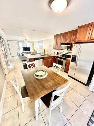 a view of a dining room with furniture