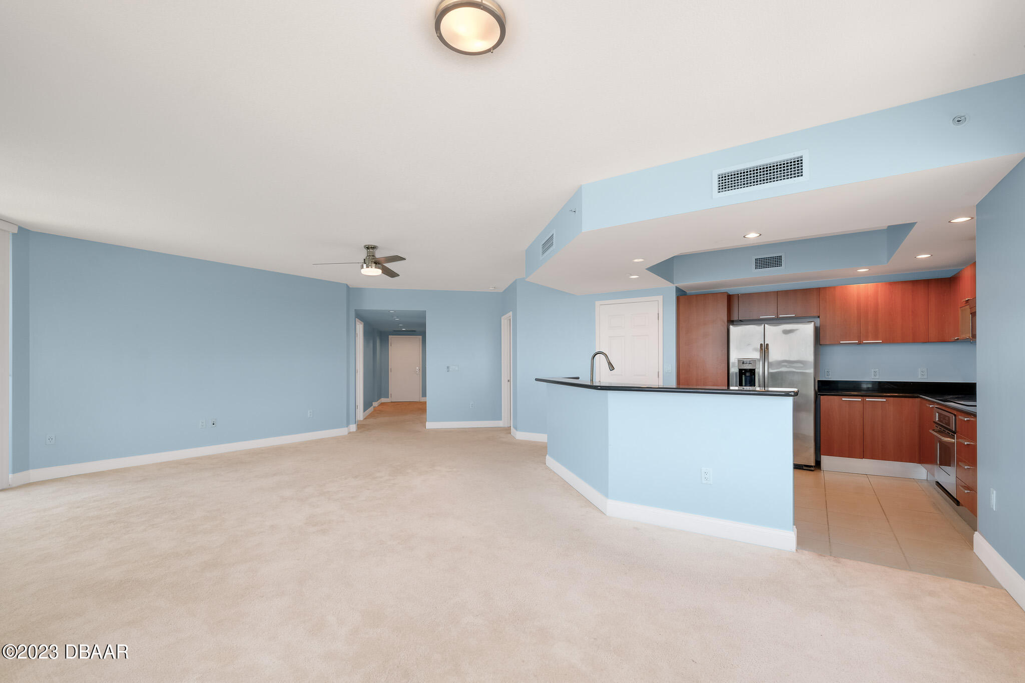241 Riverside Drive, Unit 1710 Holly Hill, FL 32117 - Photo 12 of 46 a view of a kitchen with a sink