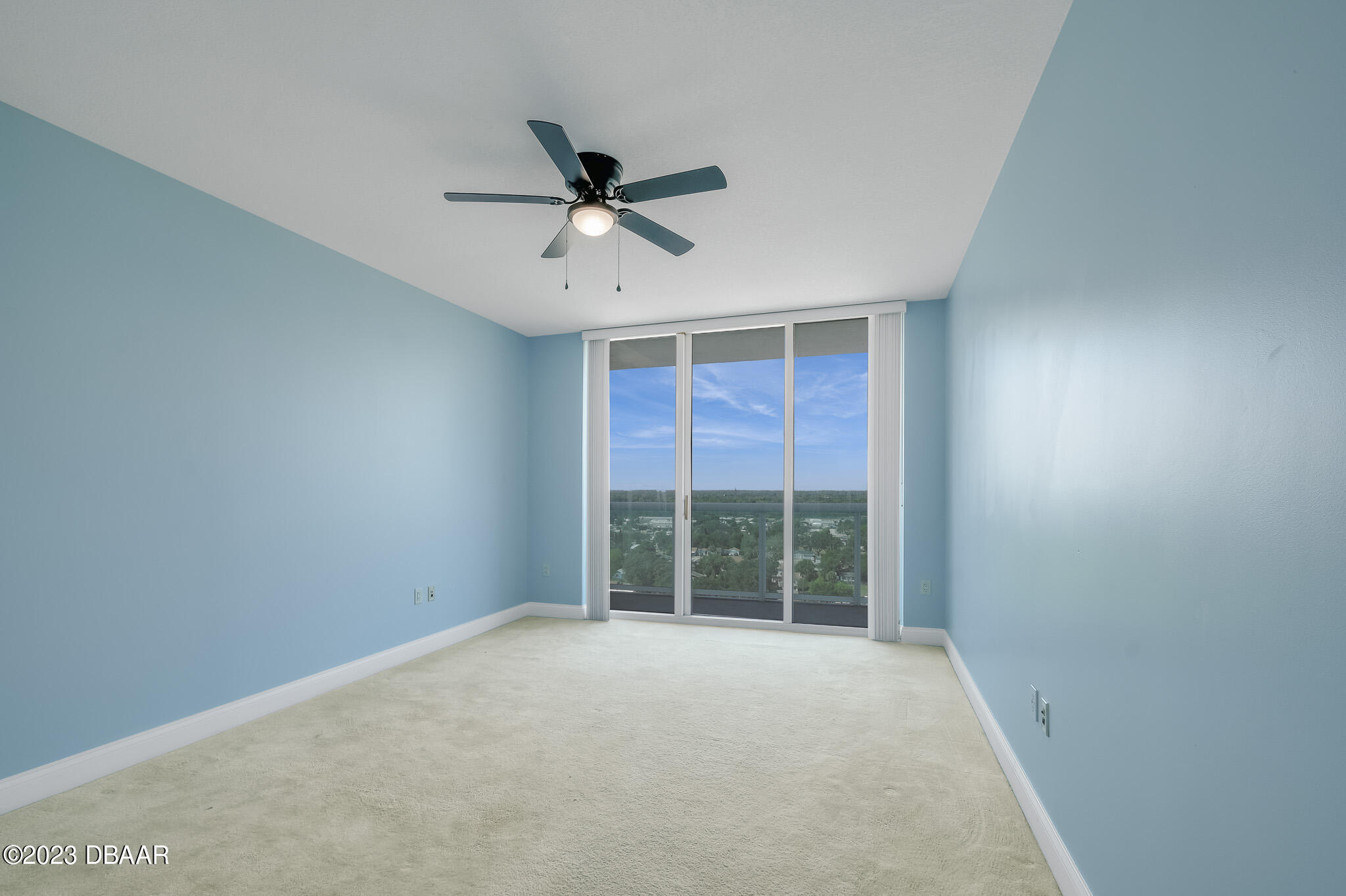 241 Riverside Drive, Unit 1710 Holly Hill, FL 32117 - Photo 16 of 46 a view of an empty room with a window