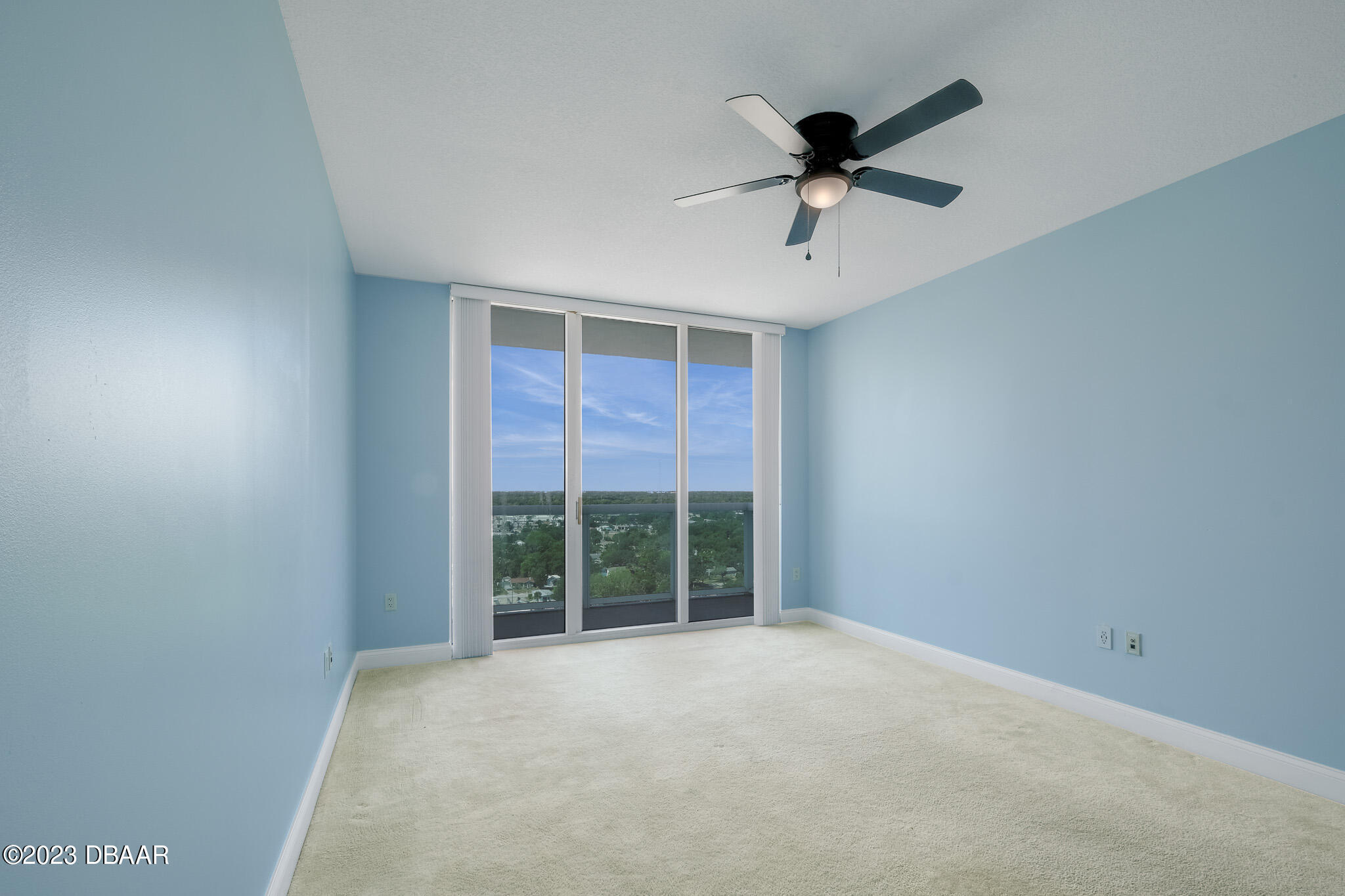 241 Riverside Drive, Unit 1710 Holly Hill, FL 32117 - Photo 17 of 46 en view of an empty room with a window