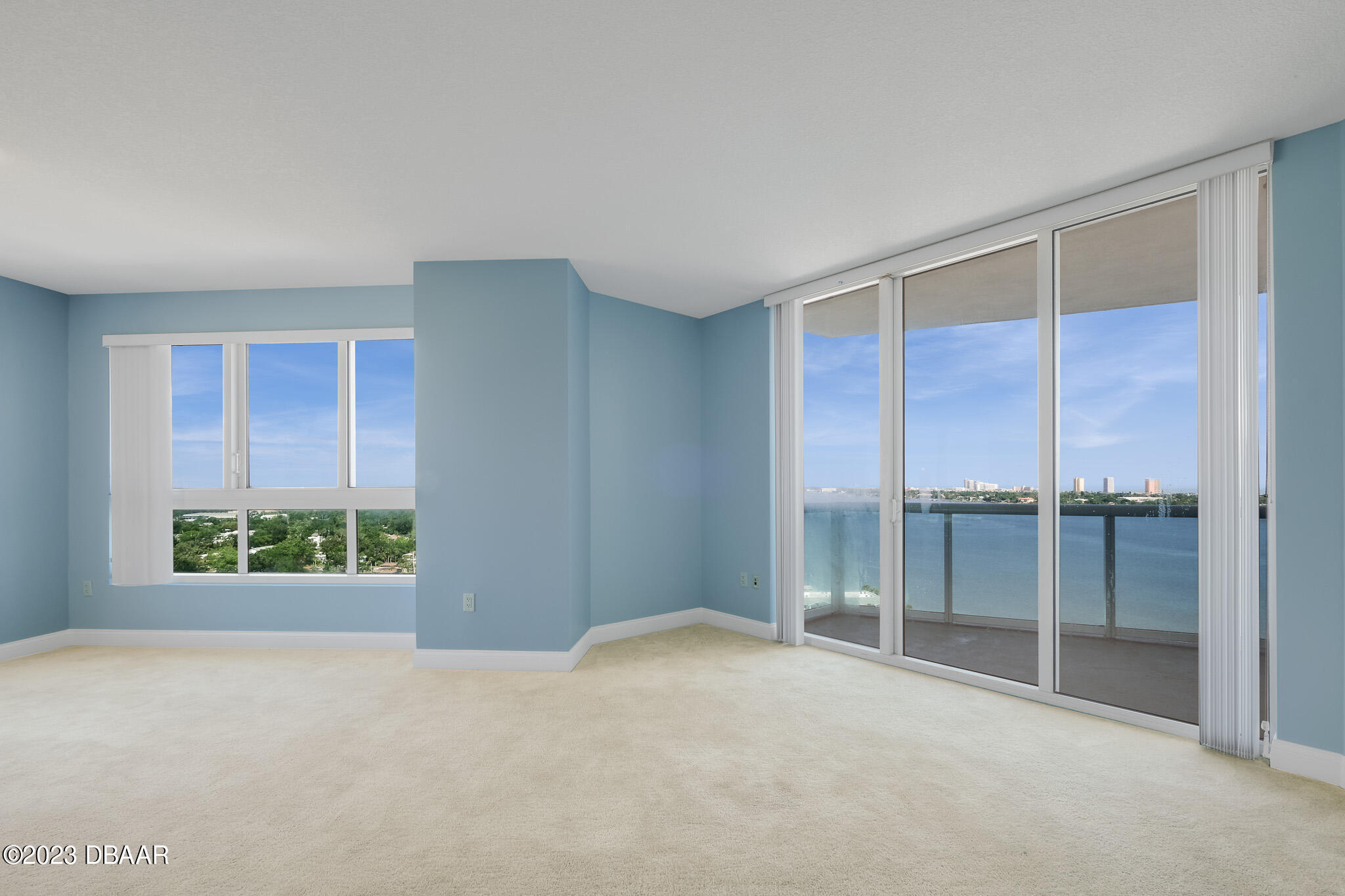 241 Riverside Drive, Unit 1710 Holly Hill, FL 32117 - Photo 5 of 46 a view of an empty room with a window