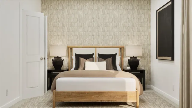 a bedroom with a bed and a night stand