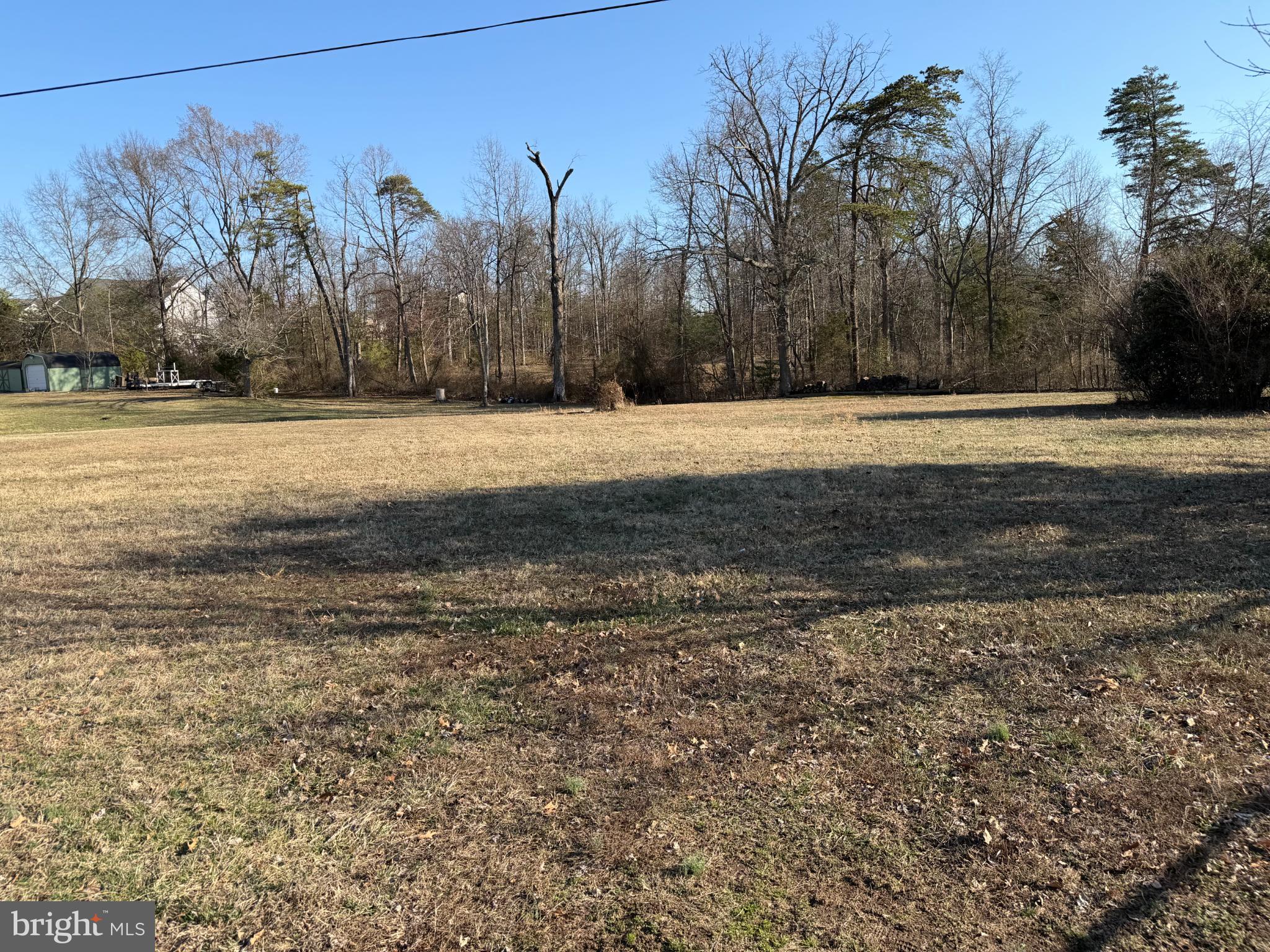 Mountain View Drive Chantilly, VA 20152 - Photo 2 of 4 Spacious lot framed by serene trees.