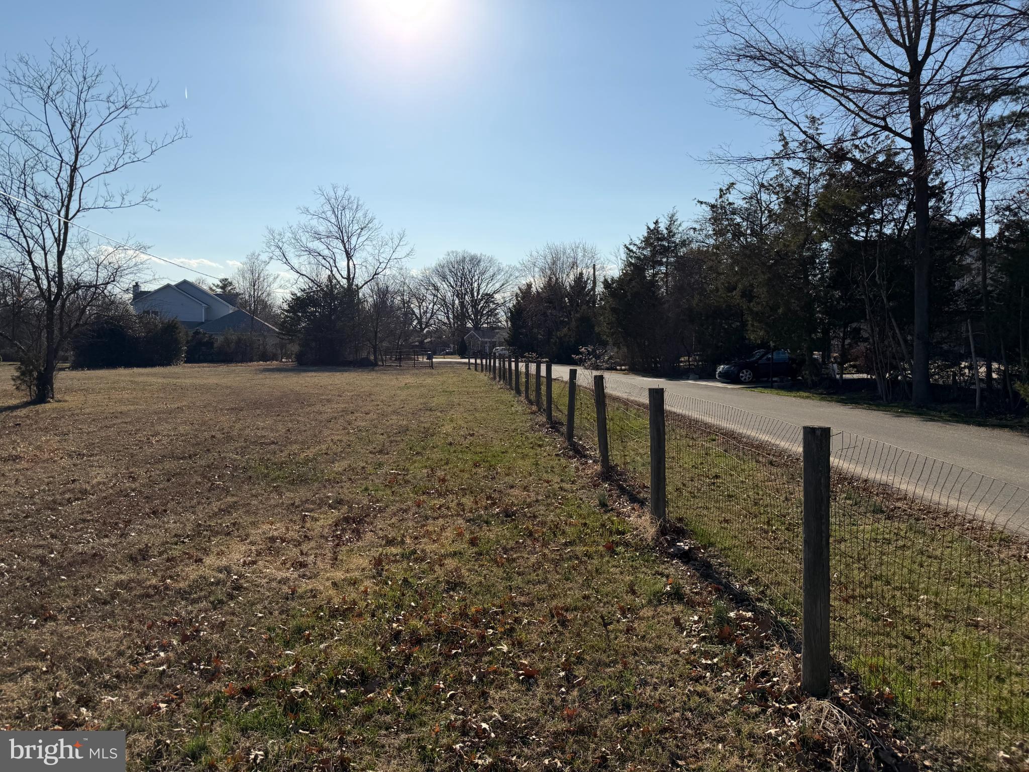 Mountain View Drive Chantilly, VA 20152 - Photo 3 of 4 Serene landscape with a rustic fence line.