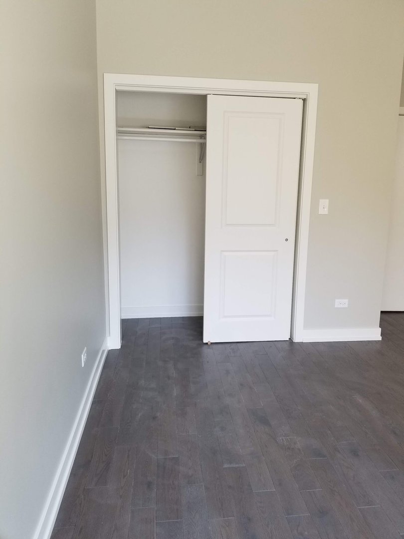 4764 North Virginia Avenue, Unit 112 Chicago, IL 60625 - Photo 8 of 12 a view of an empty room
