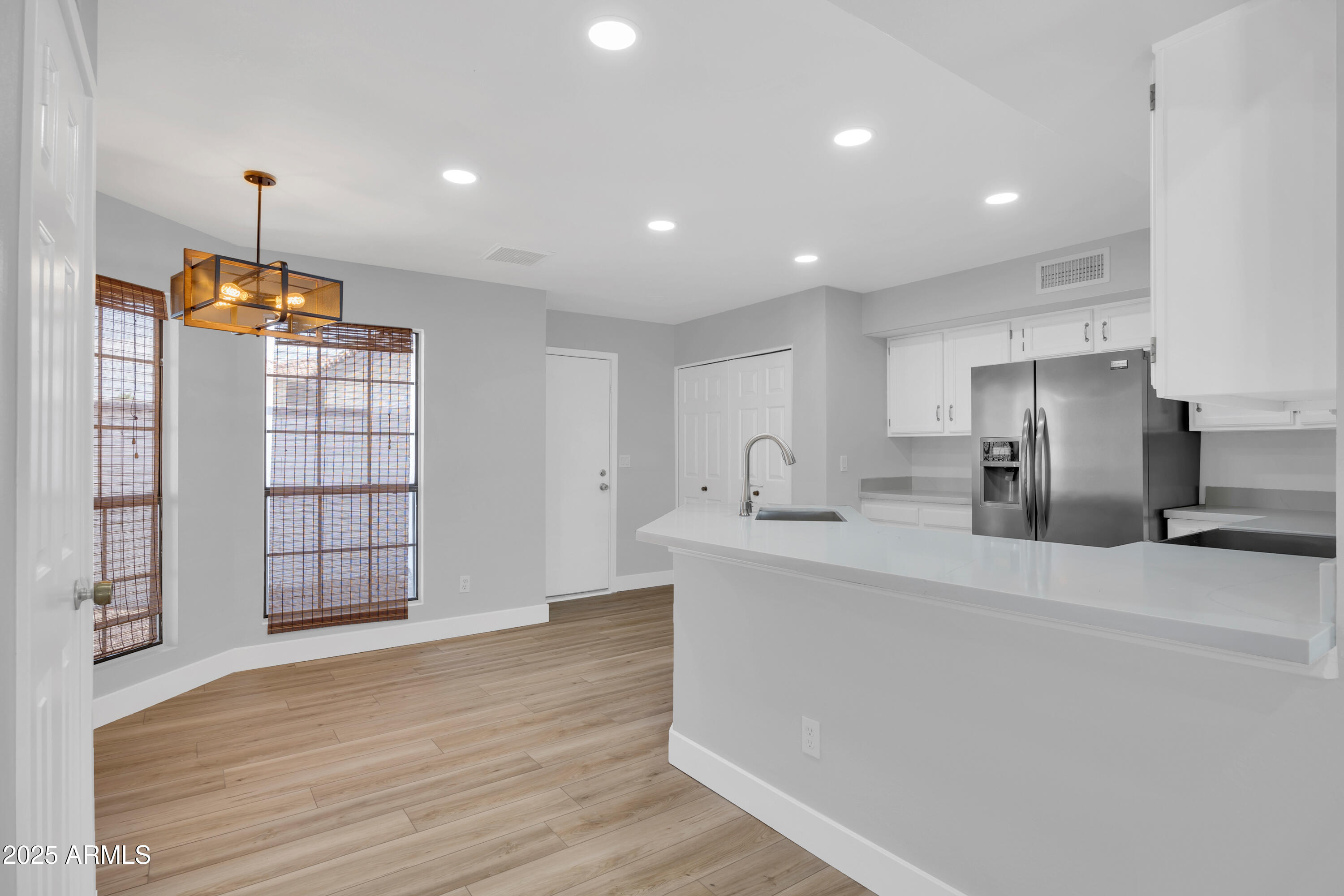 5302 West Cheryl Drive Glendale, AZ 85302 - Photo 19 of 39 a view of kitchen with refrigerator and window