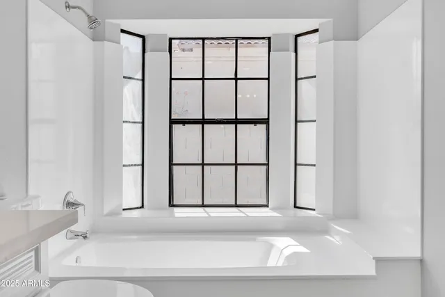 a view of a bathroom with a bathtub