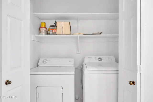 a utility room with dryer and washer