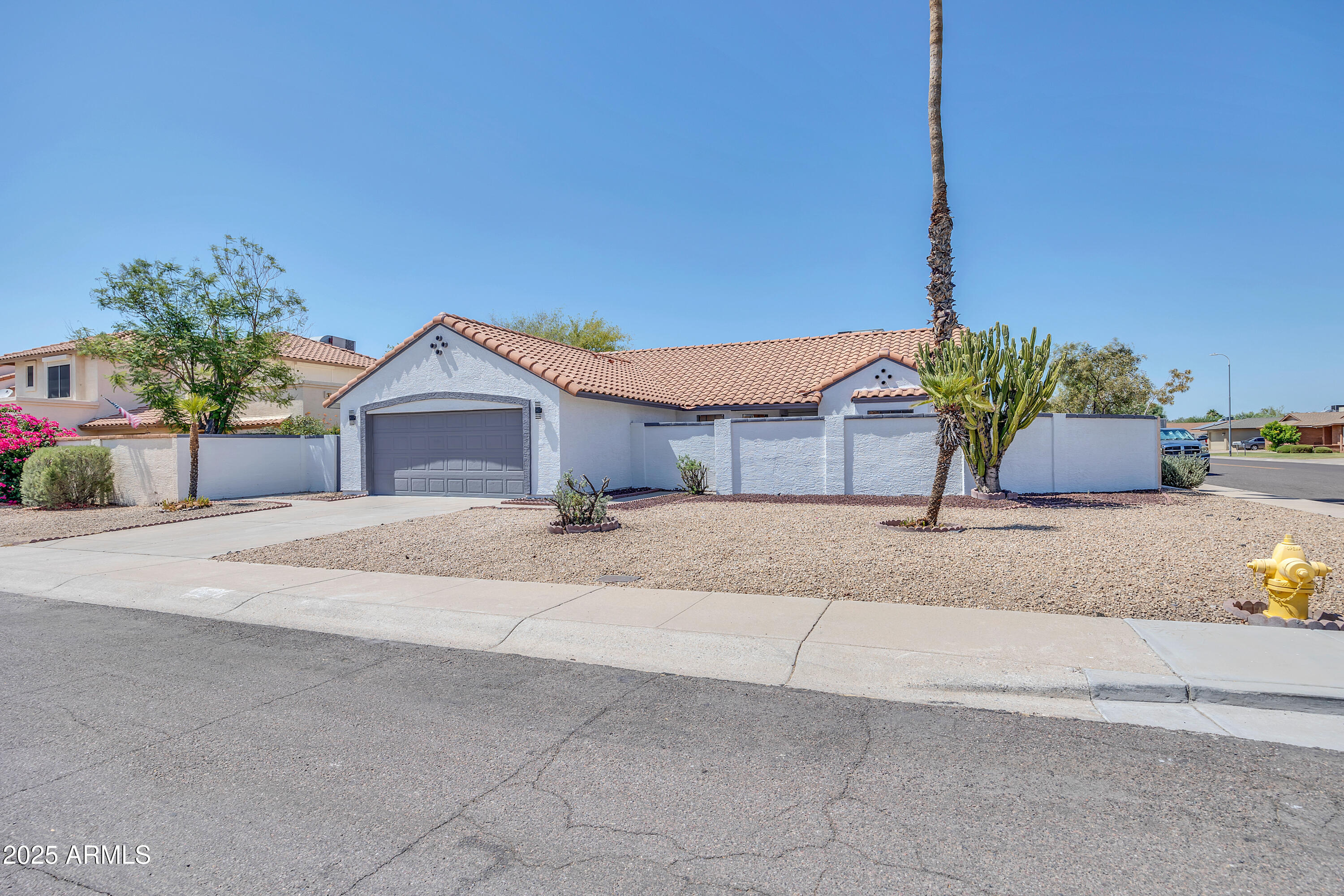 5302 West Cheryl Drive Glendale, AZ 85302 - Photo 4 of 39 a house view with a outdoor space