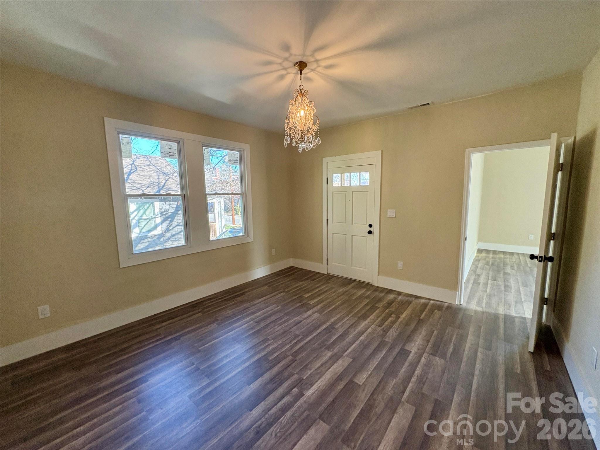 427 East Orr Street Anderson, SC 29621 - Photo 17 of 24 wooden floor in an empty room with a window