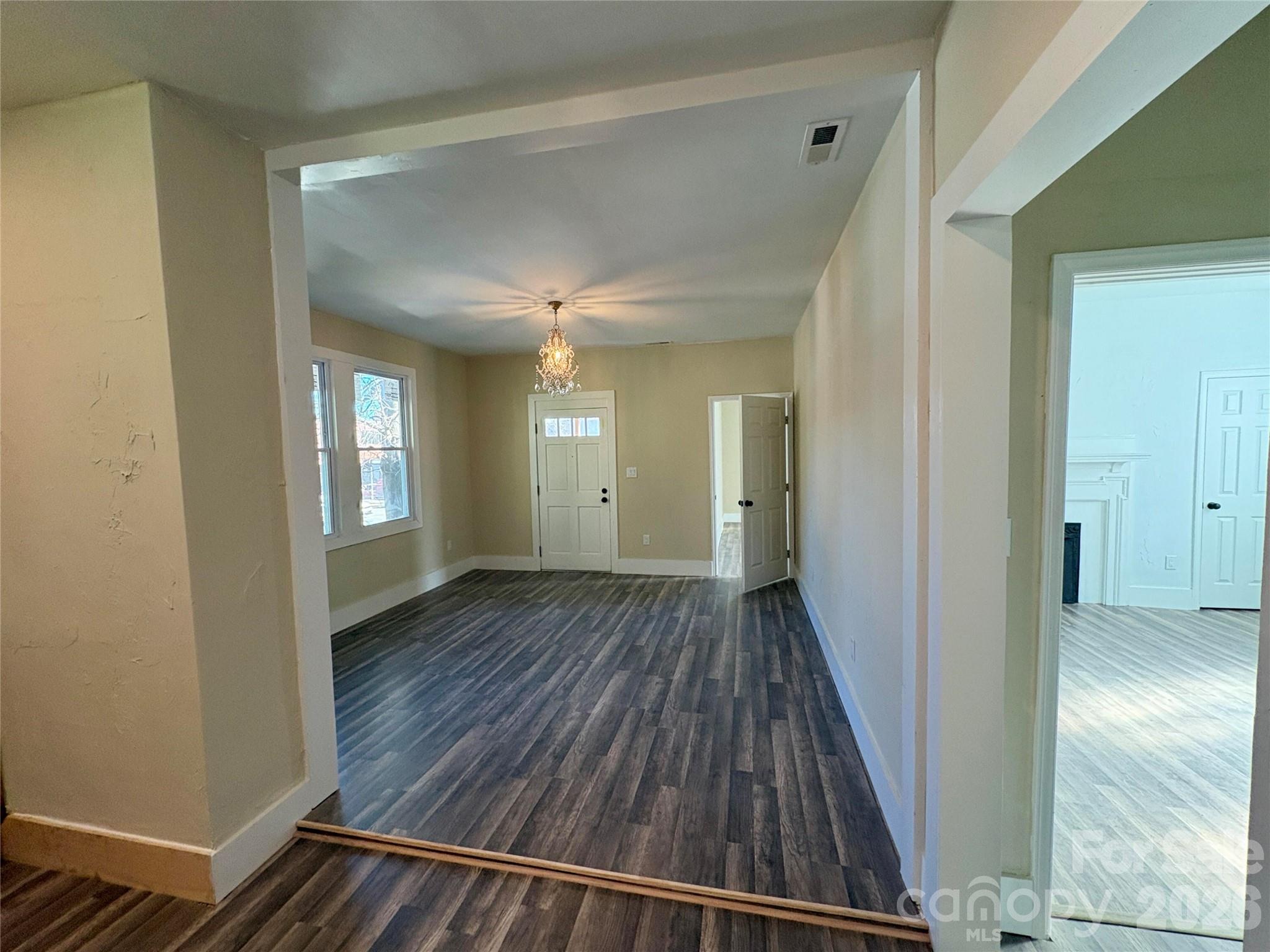 427 East Orr Street Anderson, SC 29621 - Photo 18 of 24 a view of a room with wooden floor and staircase
