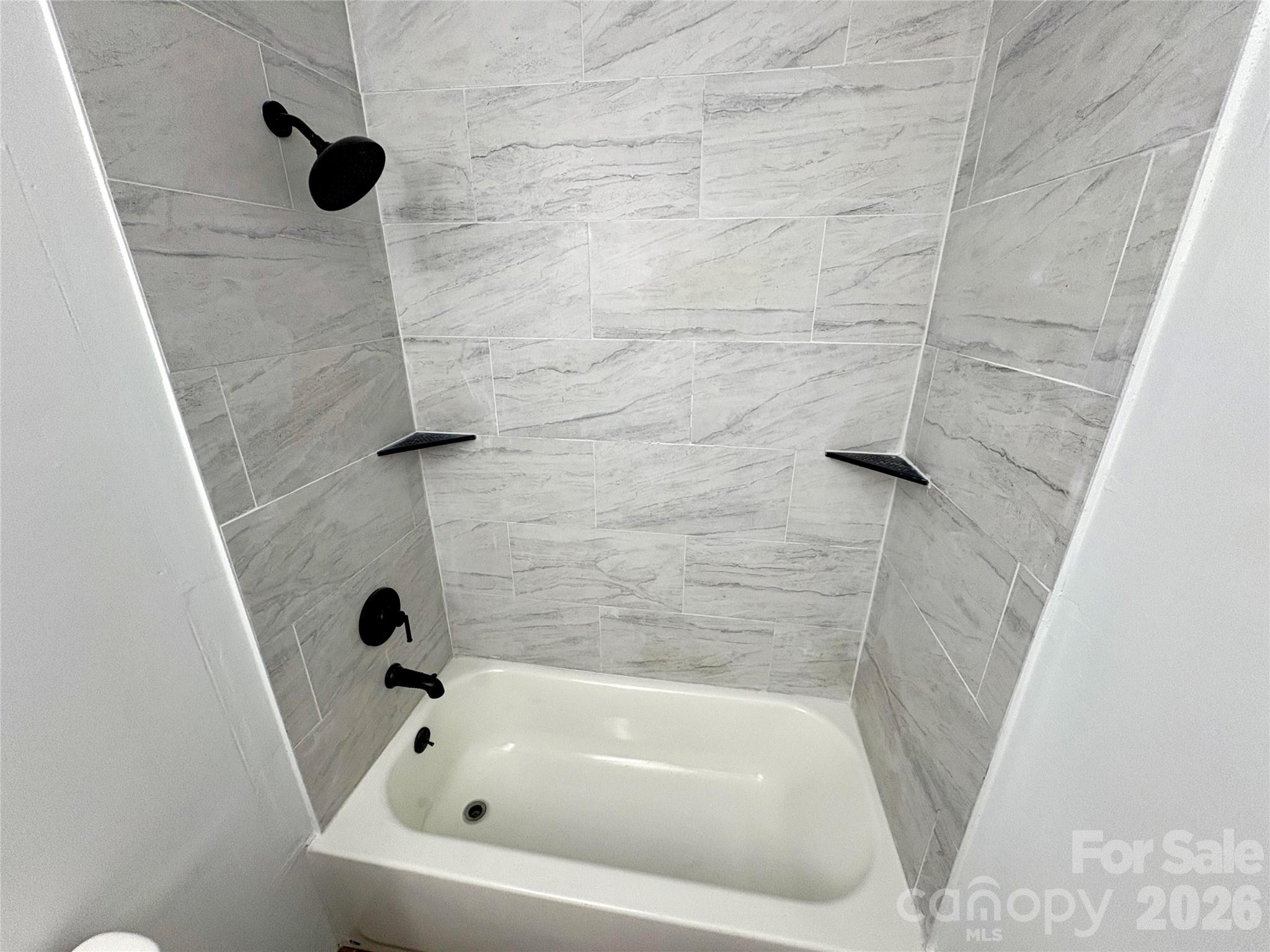 427 East Orr Street Anderson, SC 29621 - Photo 7 of 24 a bathroom with a tub