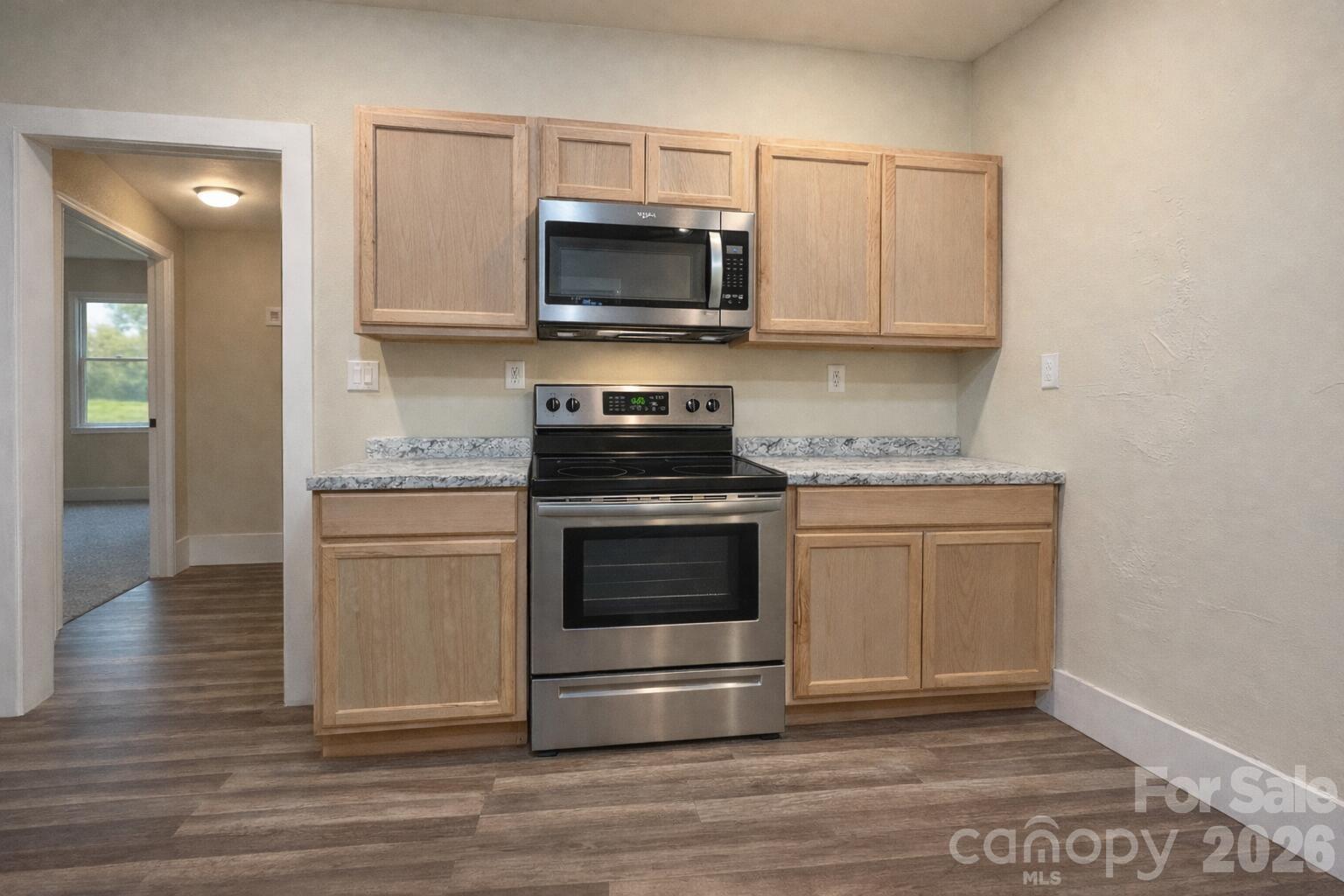 427 East Orr Street Anderson, SC 29621 - Photo 10 of 24 a kitchen with a stove and a microwave