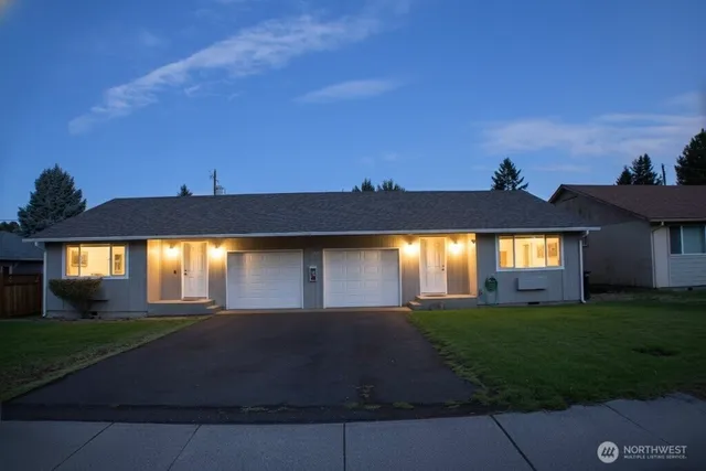 a house view with a garden space