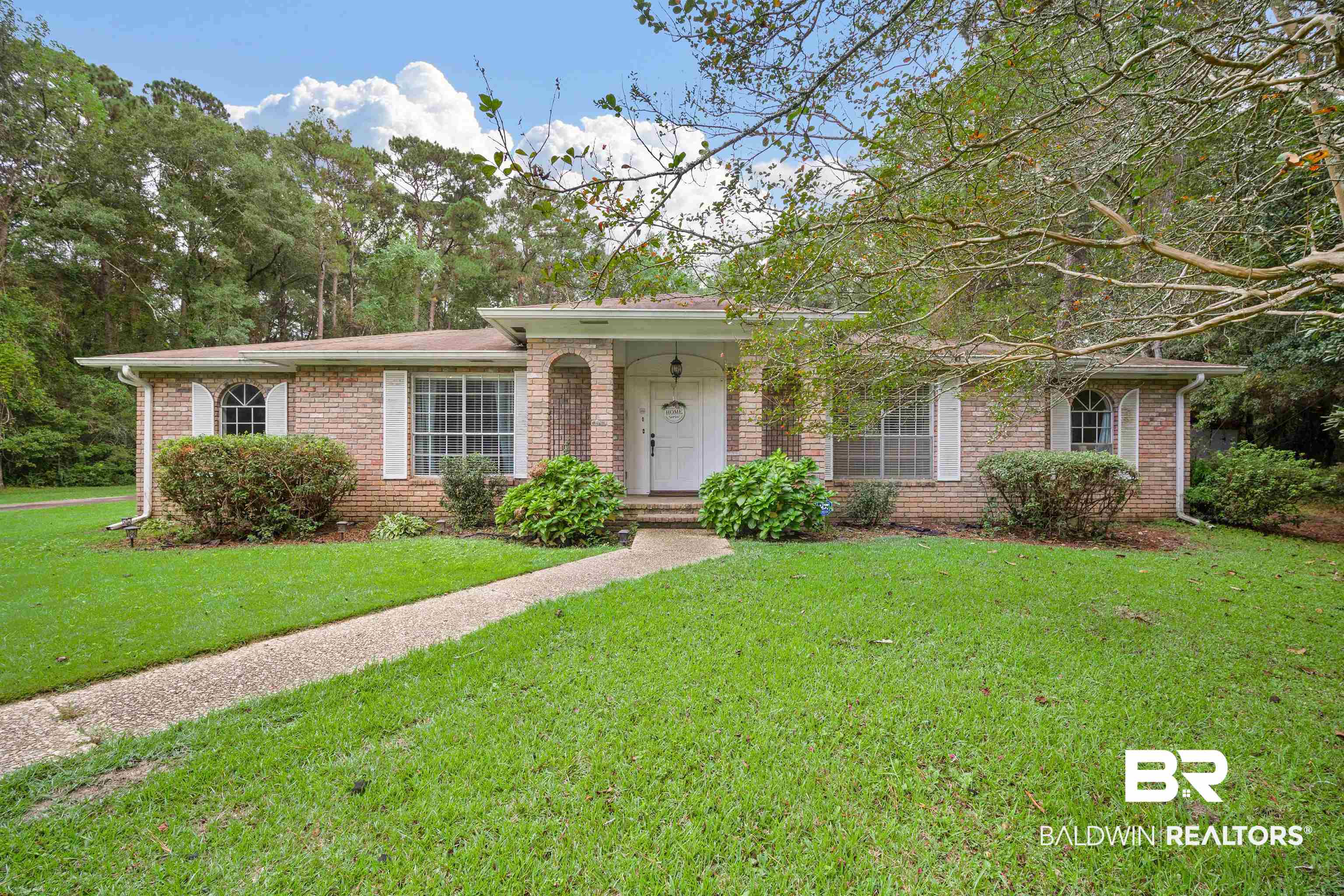 7807 Yorkhaven Road Mobile, AL 36695 - Photo 1 of 34 Ranch-style house featuring brick siding and a front lawn