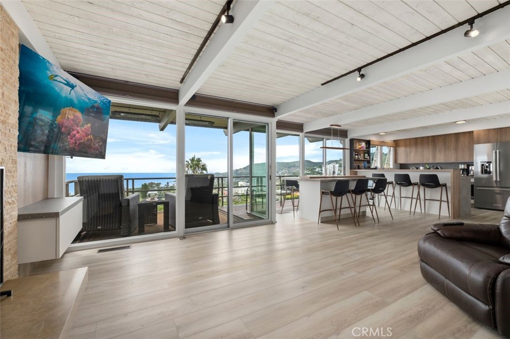 945 Coast View Drive Laguna Beach, CA 92651 - Photo 17 of 40 a lobby with furniture and wooden floor