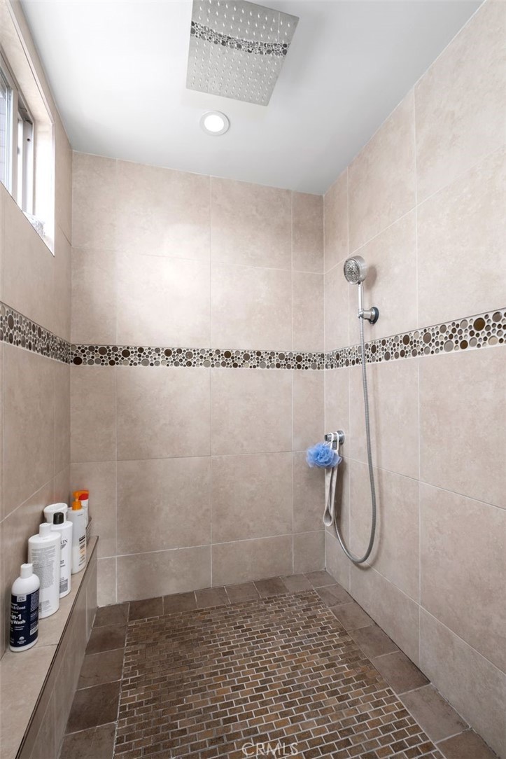 945 Coast View Drive Laguna Beach, CA 92651 - Photo 27 of 40 a bathroom with a shower