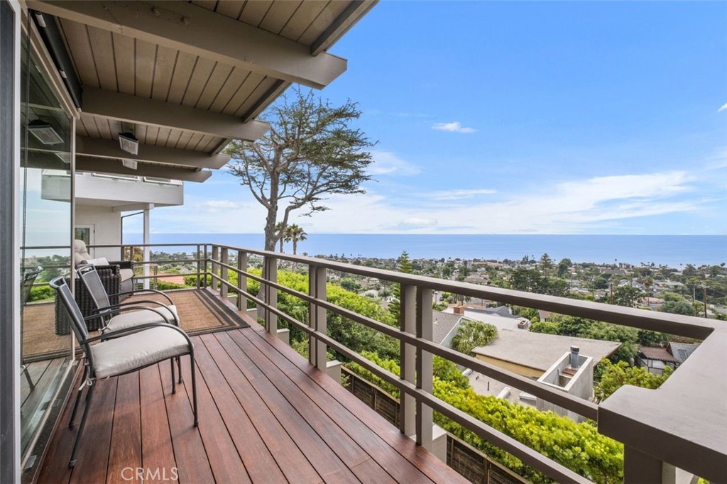 945 Coast View Drive Laguna Beach, CA 92651 - Photo 32 of 40 a view of a balcony with chairs