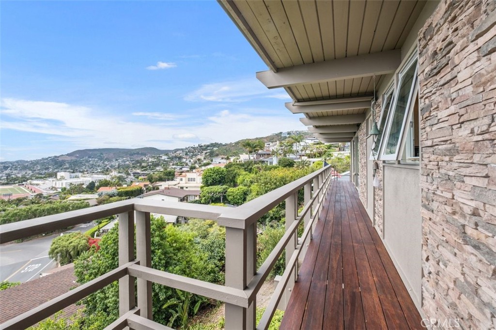 945 Coast View Drive Laguna Beach, CA 92651 - Photo 36 of 40 a view of a balcony with wooden floor