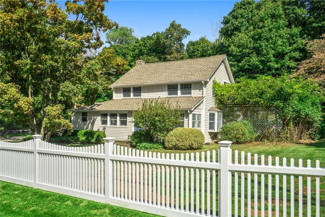 375 Long Ridge Road Pound Ridge, NY 10576 - Photo 1 of 1 a view of a house with a small yard and plants