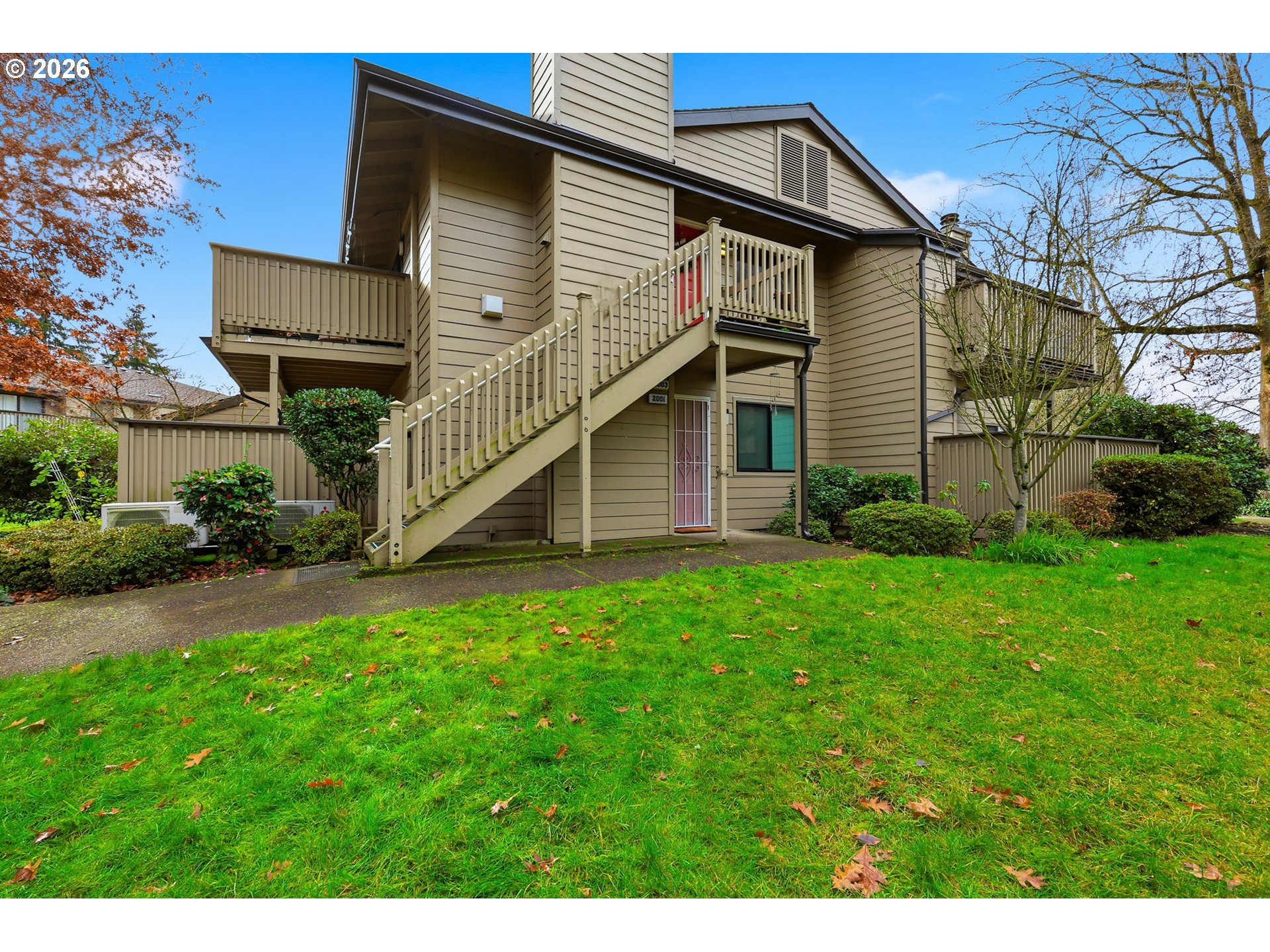 2001 Lake Isle Terrace Eugene, OR 97401 - Photo 1 of 36 a front view of a house with garden