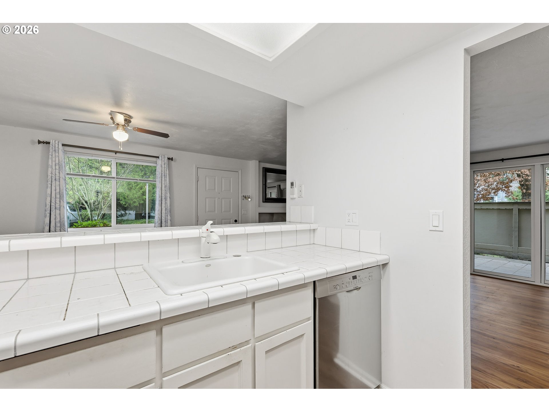 2001 Lake Isle Terrace Eugene, OR 97401 - Photo 15 of 36 a room with a sink and large mirror