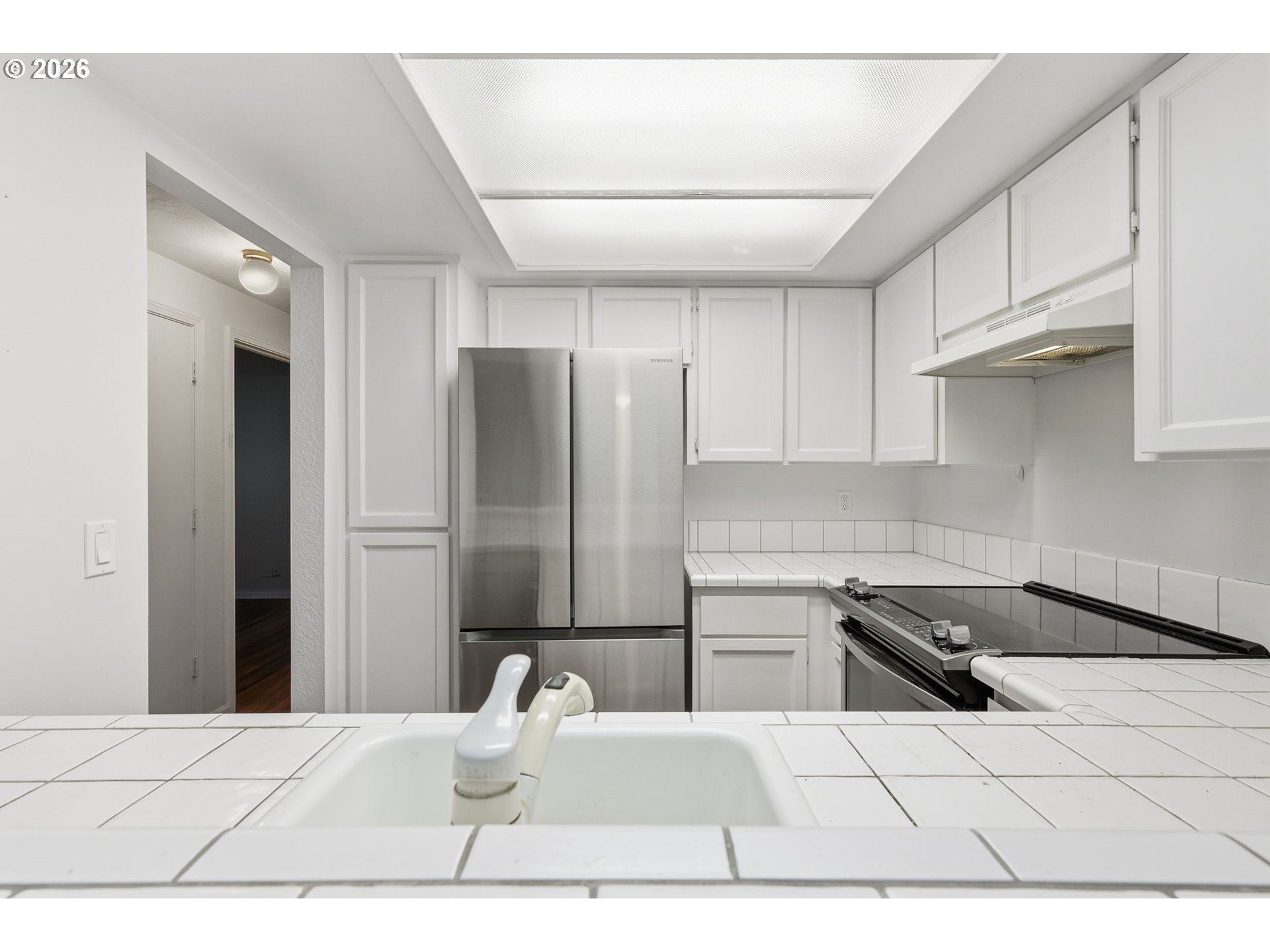 2001 Lake Isle Terrace Eugene, OR 97401 - Photo 16 of 36 a kitchen with a sink appliances and cabinets