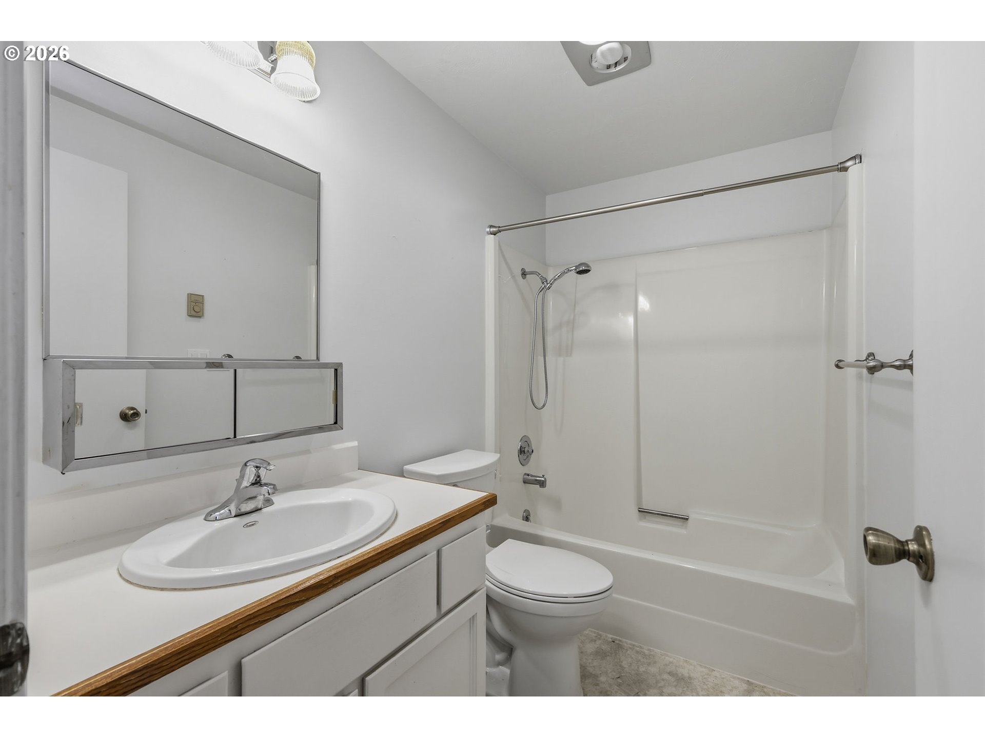 2001 Lake Isle Terrace Eugene, OR 97401 - Photo 25 of 36 a bathroom with a sink a toilet and shower