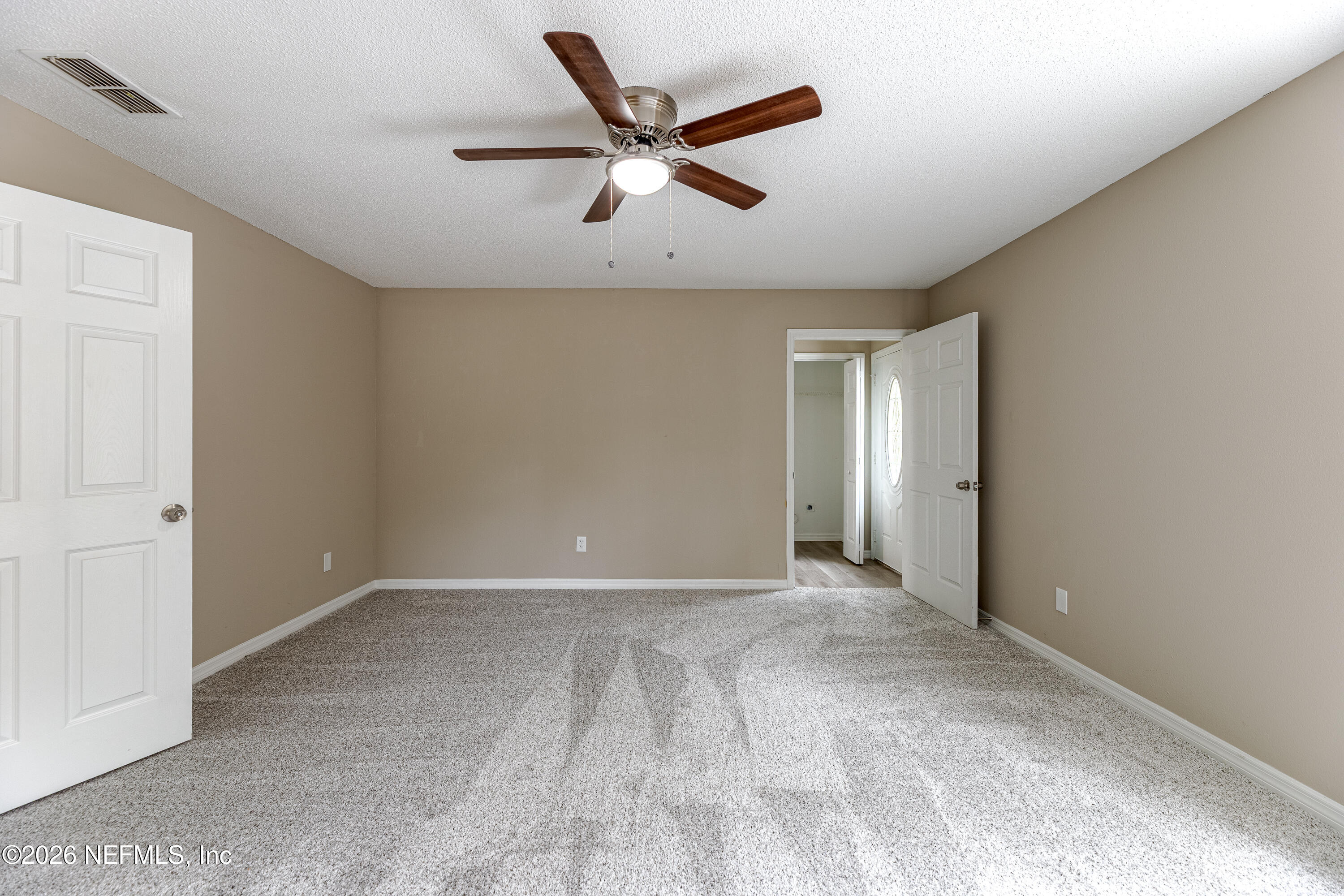 67104 Elnora Lane Yulee, FL 32097 - Photo 18 of 39 a view of an empty room