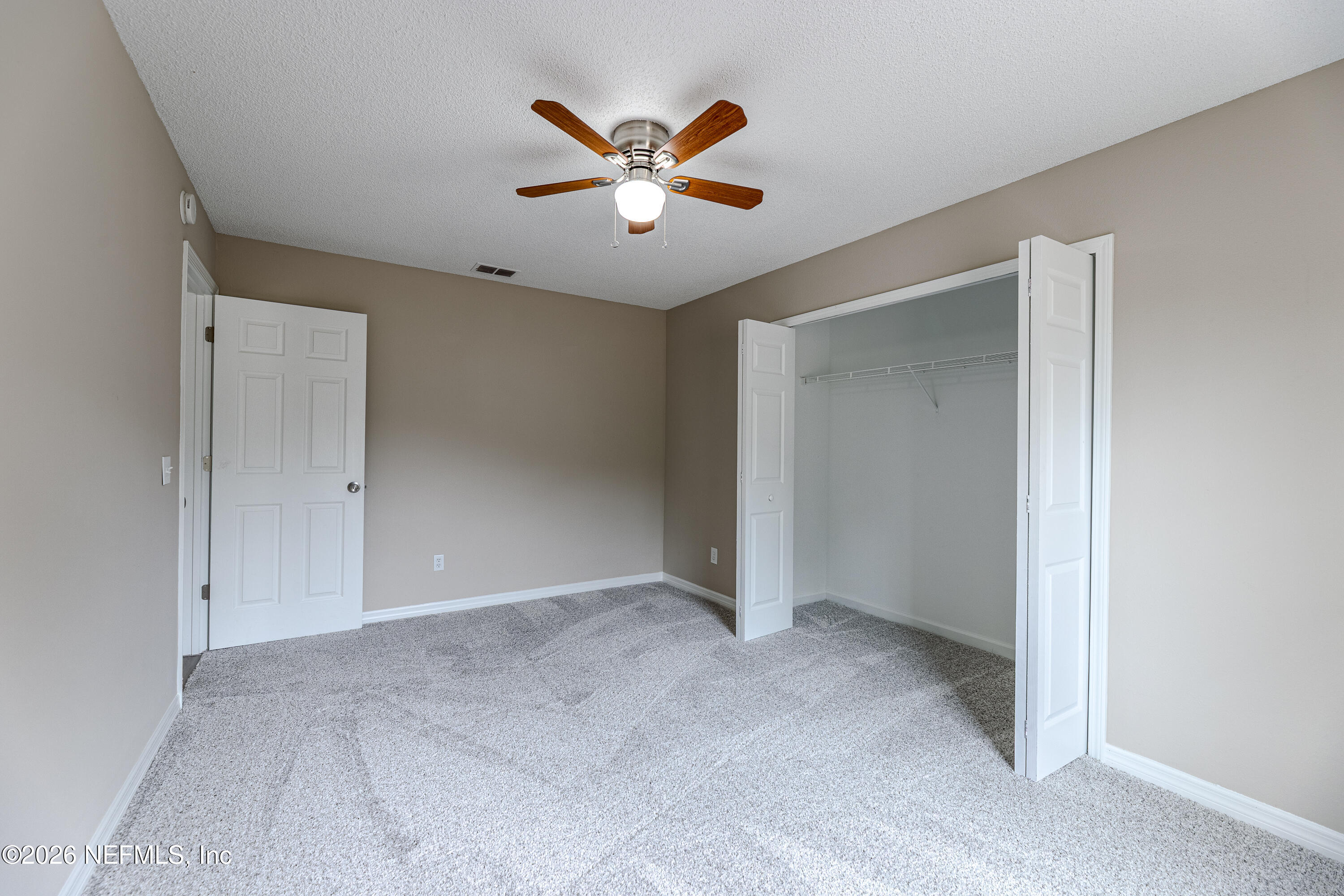 67104 Elnora Lane Yulee, FL 32097 - Photo 31 of 39 a view of an empty room