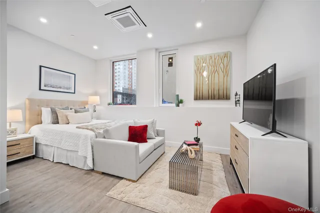 a kitchen that has a sink and cabinets