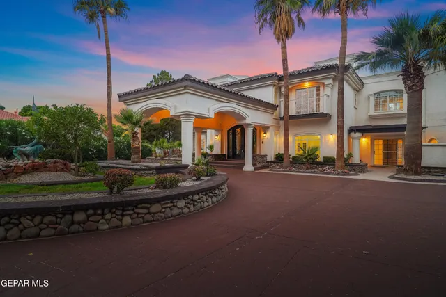 a kitchen with a stove a refrigerator and a sink