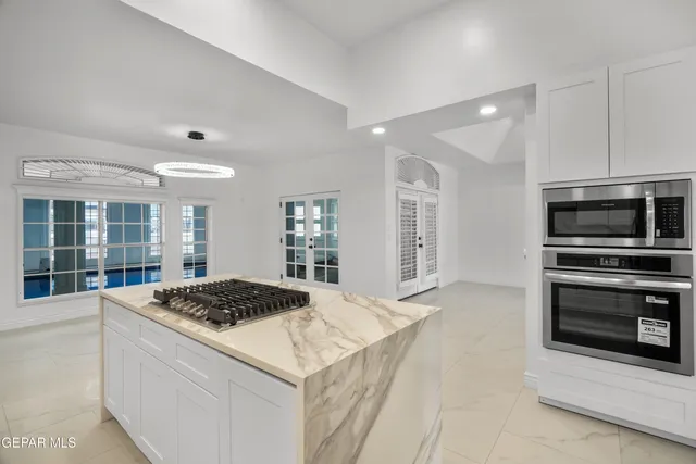 a view of staircase with rug floor