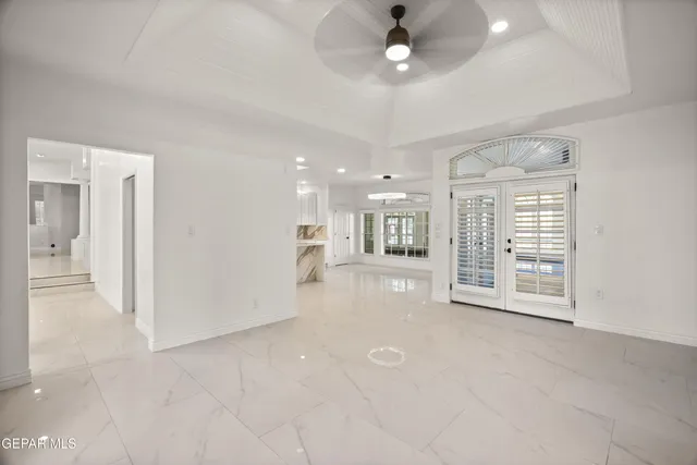 a view of a house with a yard and a garage
