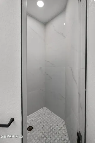 an aerial view of residential building with outdoor space and lake view