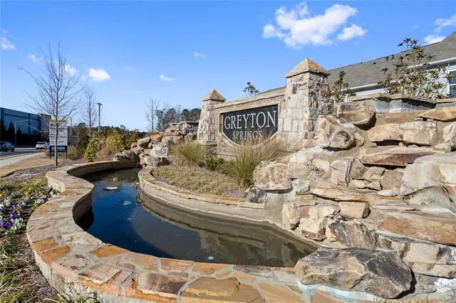 a view of a living room and kitchen area