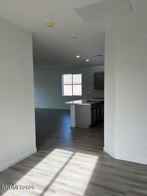760 Kess Way, Unit LOT 86 Reno, NV 89506 - Photo 11 of 14 a view of a kitchen with wooden floor and a sink