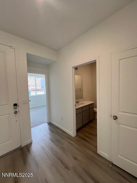 760 Kess Way, Unit LOT 86 Reno, NV 89506 - Photo 13 of 14 a view of a hallway with wooden floor and closet