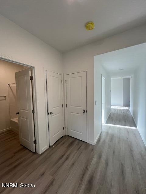 760 Kess Way, Unit LOT 86 Reno, NV 89506 - Photo 14 of 14 a view of a hallway with wooden floor and closet area