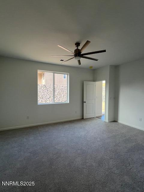 760 Kess Way, Unit LOT 86 Reno, NV 89506 - Photo 6 of 14 an empty room with windows and fan