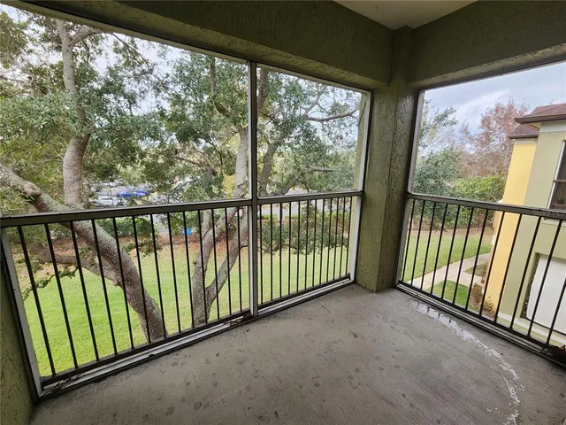 a living room with furniture and gym equipment