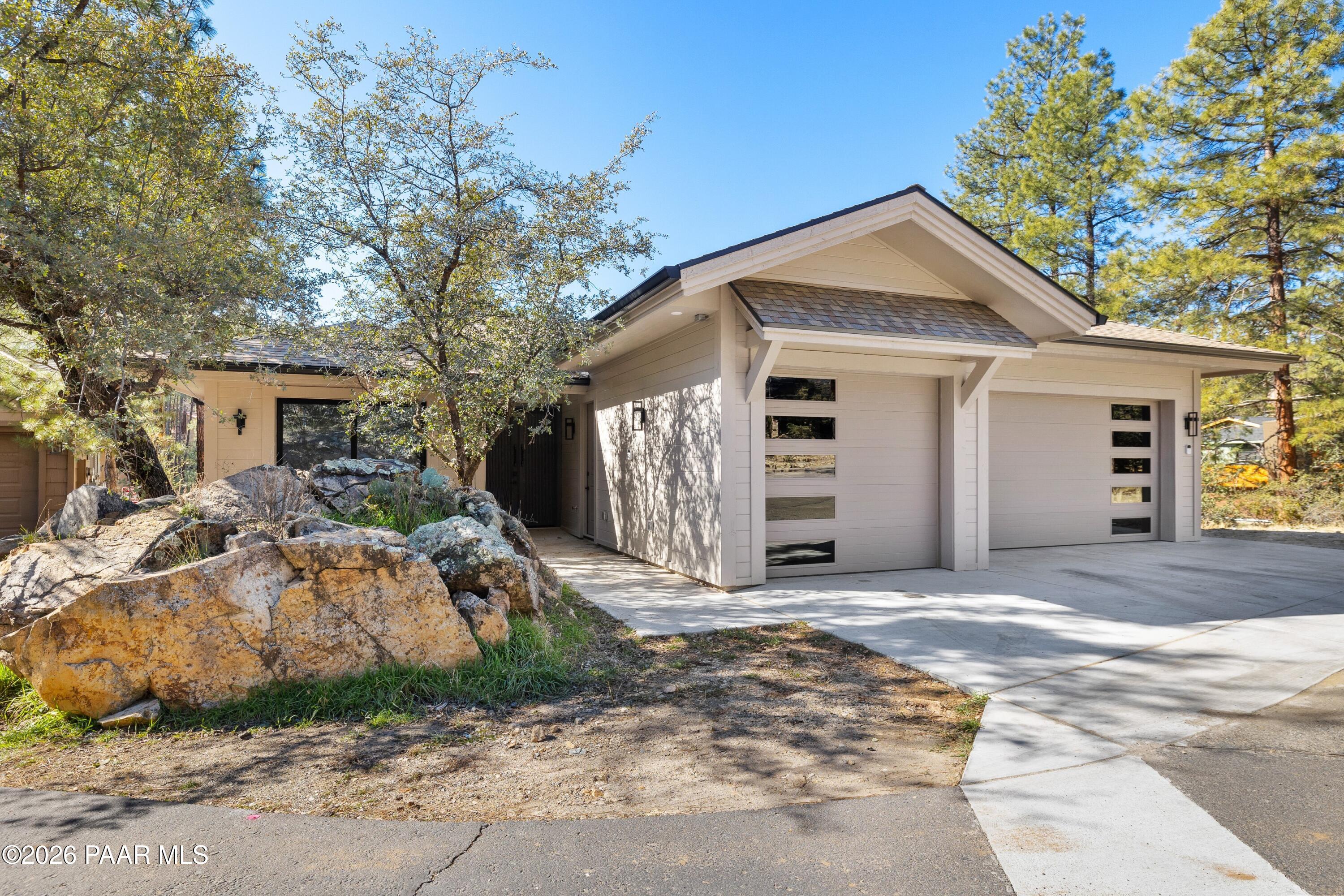 625 Aspen Way Prescott, AZ 86303 - Photo 46 of 48 a front view of a house with a yard