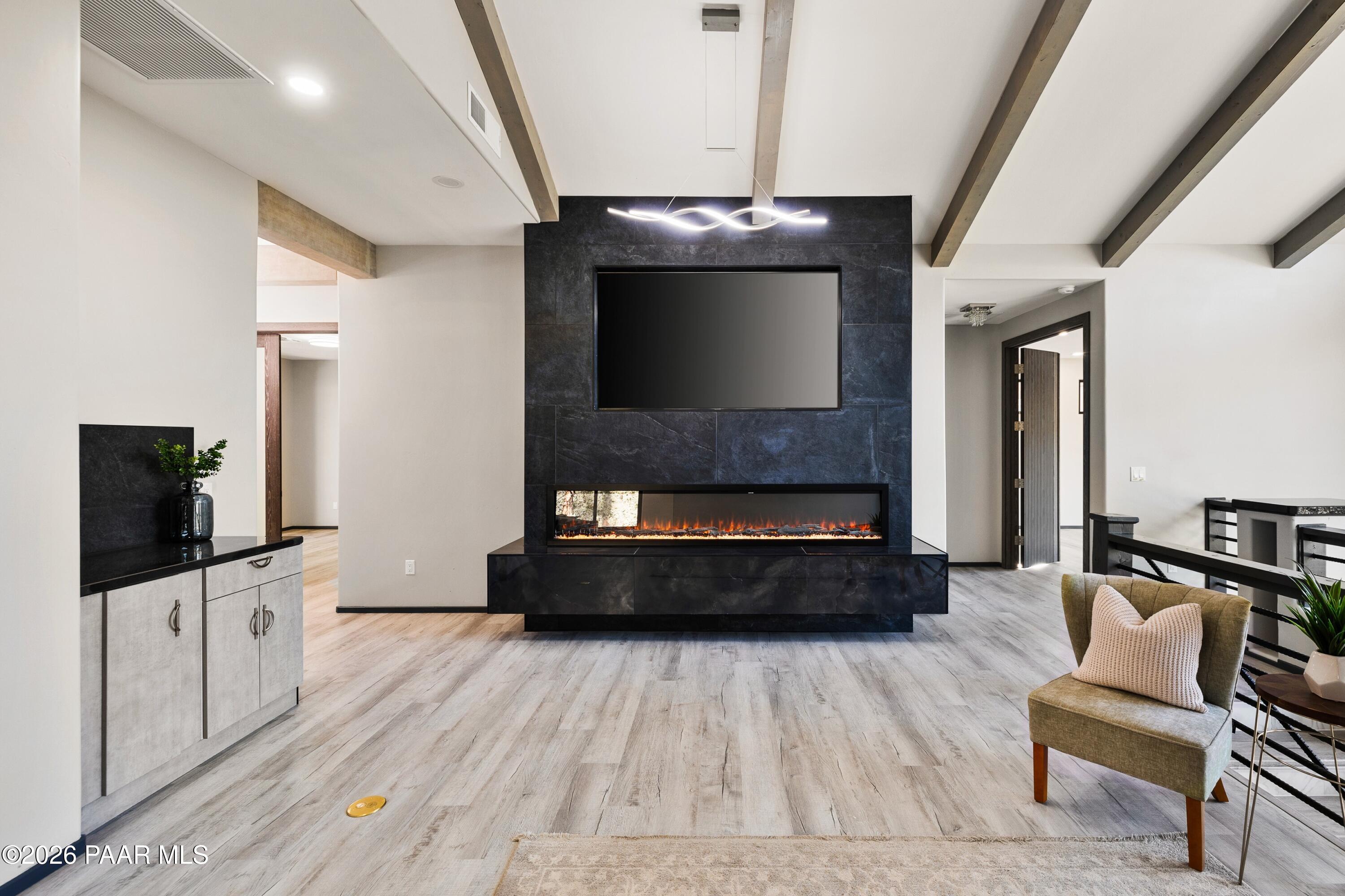 625 Aspen Way Prescott, AZ 86303 - Photo 8 of 48 008_TV stays and Electirc Fireplace