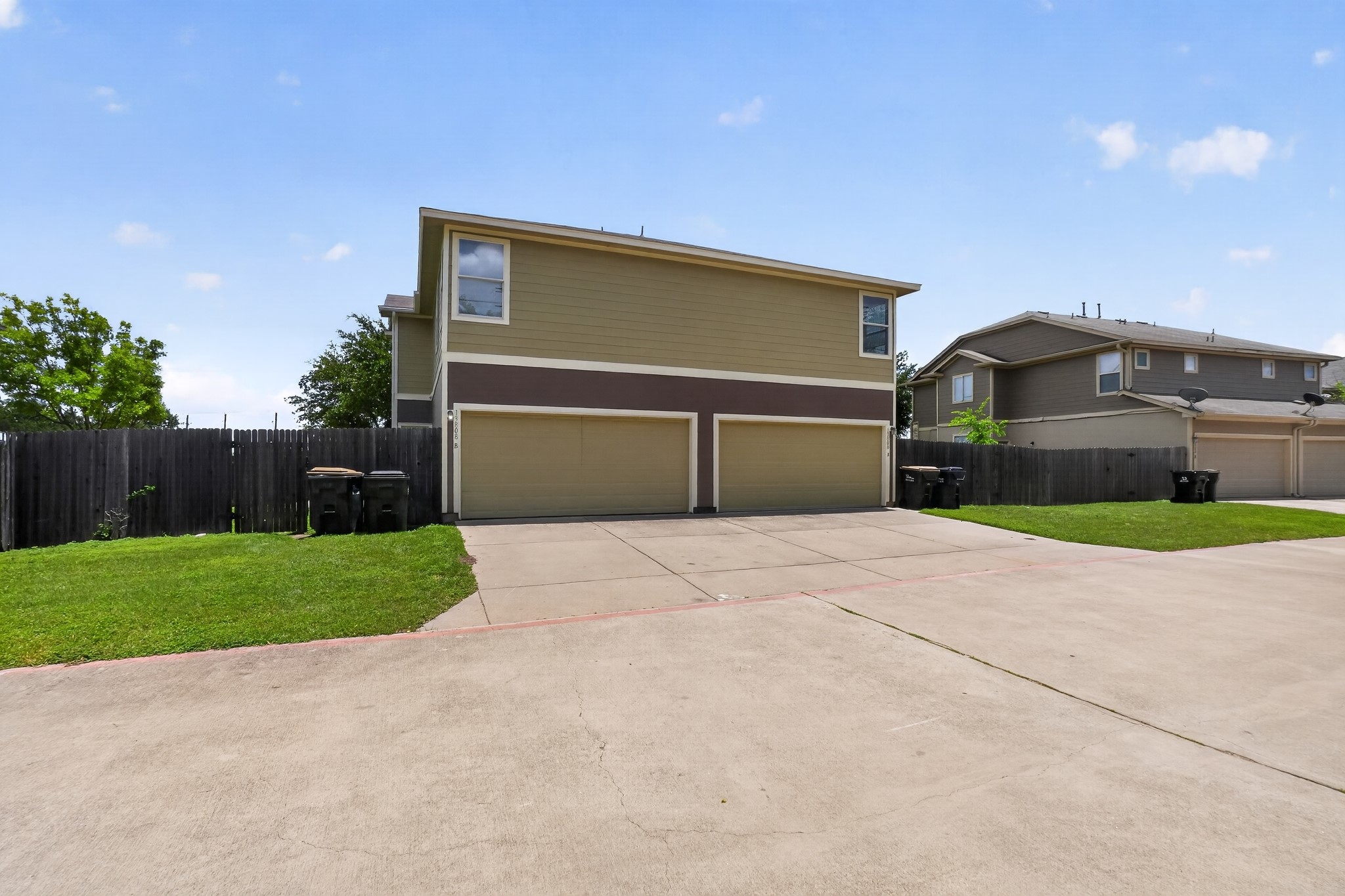 13808 Harris Ridge Boulevard Pflugerville, TX 78660 - Photo 5 of 40 a front view of a house with a yard and garage
