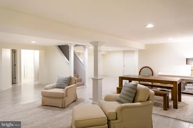 a living room with furniture and a couch