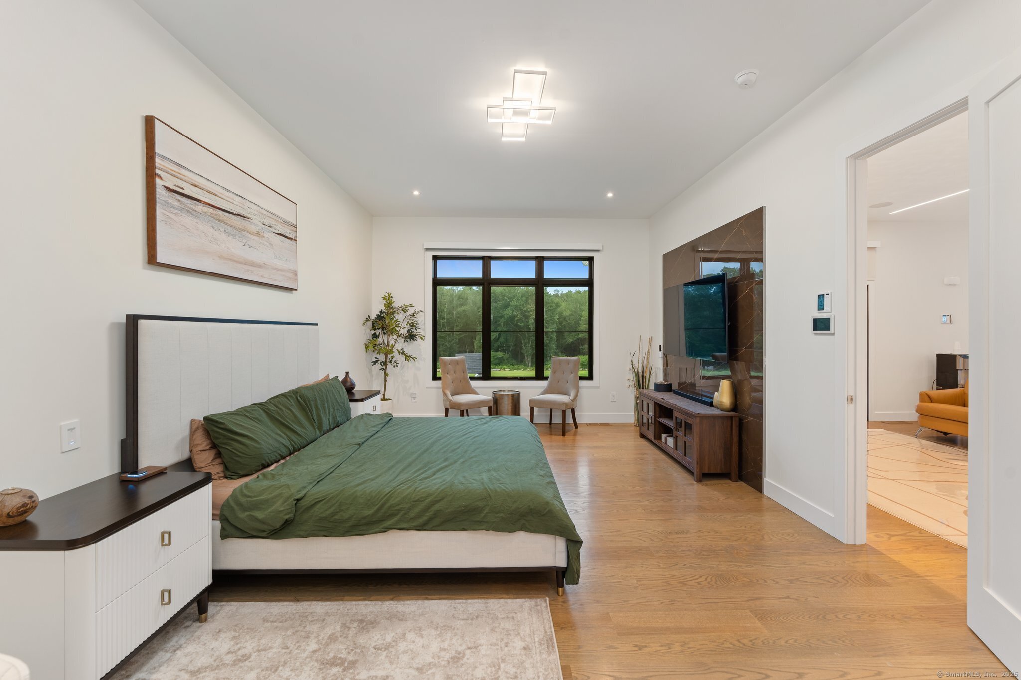 Undisclosed Address Norwich, CT 06360 - Photo 12 of 40 a living room with furniture rug and a large window