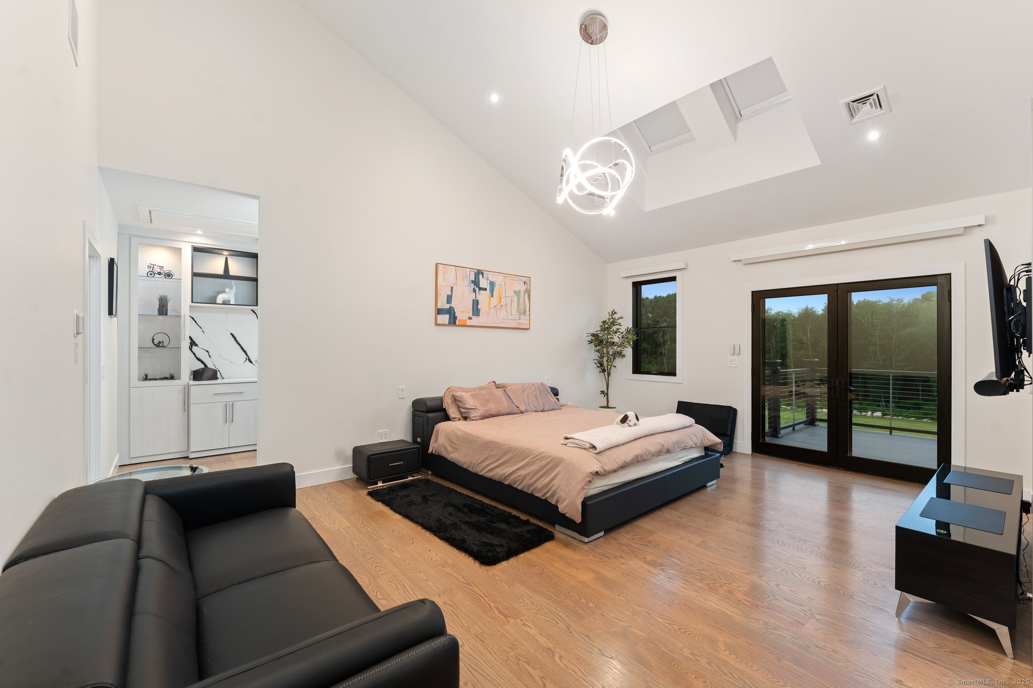 Undisclosed Address Norwich, CT 06360 - Photo 16 of 40 a bedroom with furniture and a large window